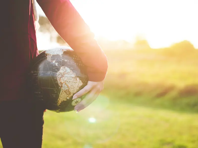 Photo by <a href="https://unsplash.com/@benwhitephotography?utm_content=creditCopyText&utm_medium=referral&utm_source=unsplash">Ben White</a> on <a href="https://unsplash.com/photos/person-holding-black-and-brown-globe-ball-while-standing-on-grass-land-golden-hour-photography-gEKMstKfZ6w?utm_content=creditCopyText&utm_medium=referral&utm_source=unsplash">Unsplash</a>